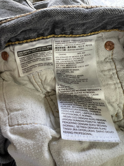 Vintage Y2K Levi’s 501 Distressed Faded Black Raw Cut Hem