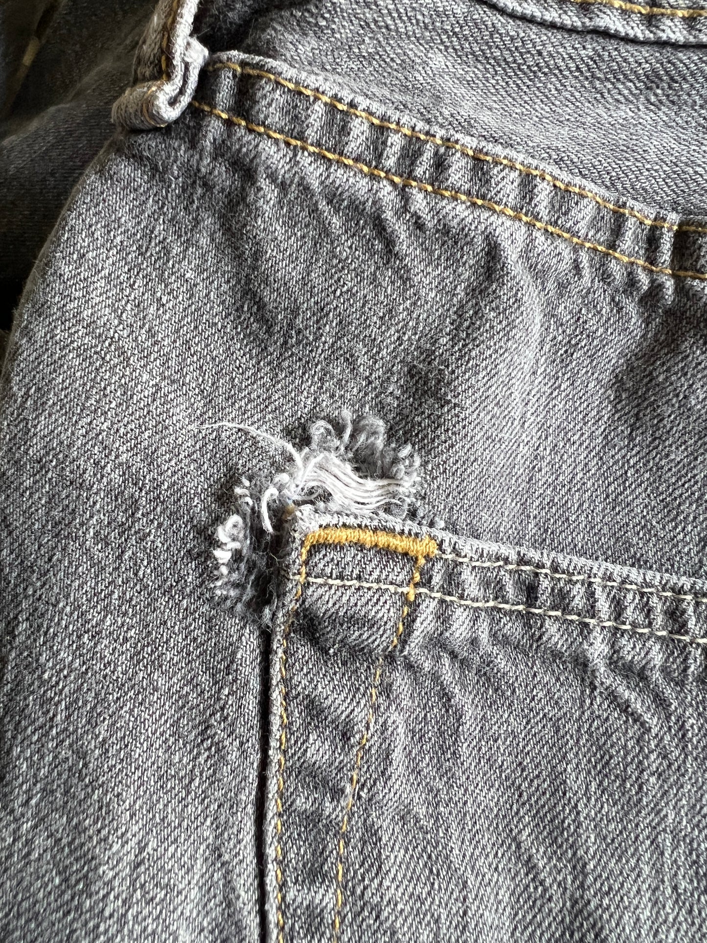 Vintage Y2K Levi’s 501 Distressed Faded Black Raw Cut Hem