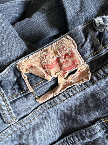 Vintage Y2K Levi’s 501 Distressed Faded Black Raw Cut Hem